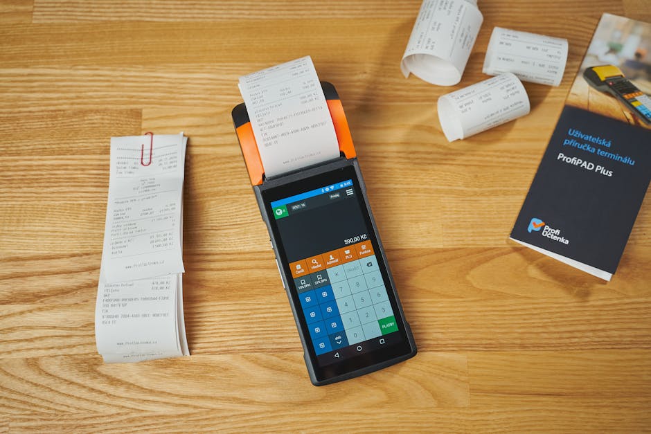 Accountant reviewing printed receipts with client